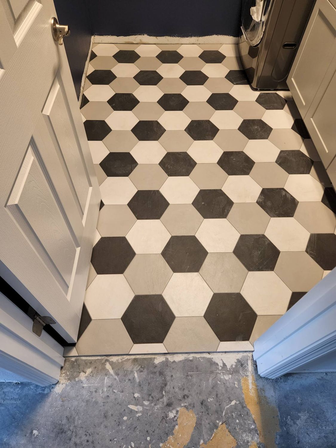 Black white hex floor tile by Stephen Wade Gibson Flooring, Central Florida
