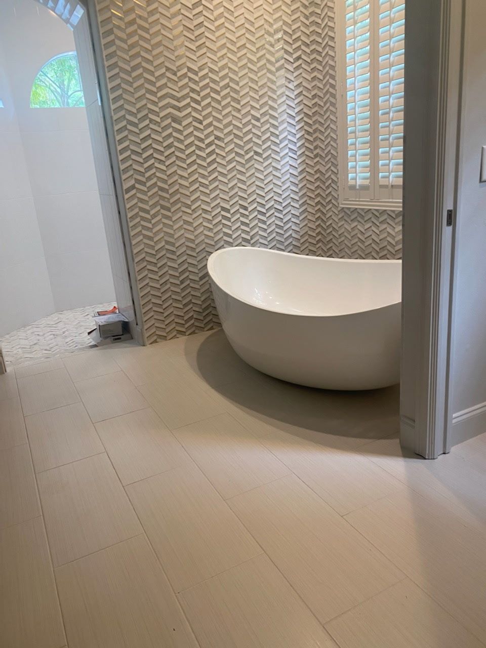 Freestanding tub chevron wall wide by Stephen Wade Gibson Flooring, Central Florida