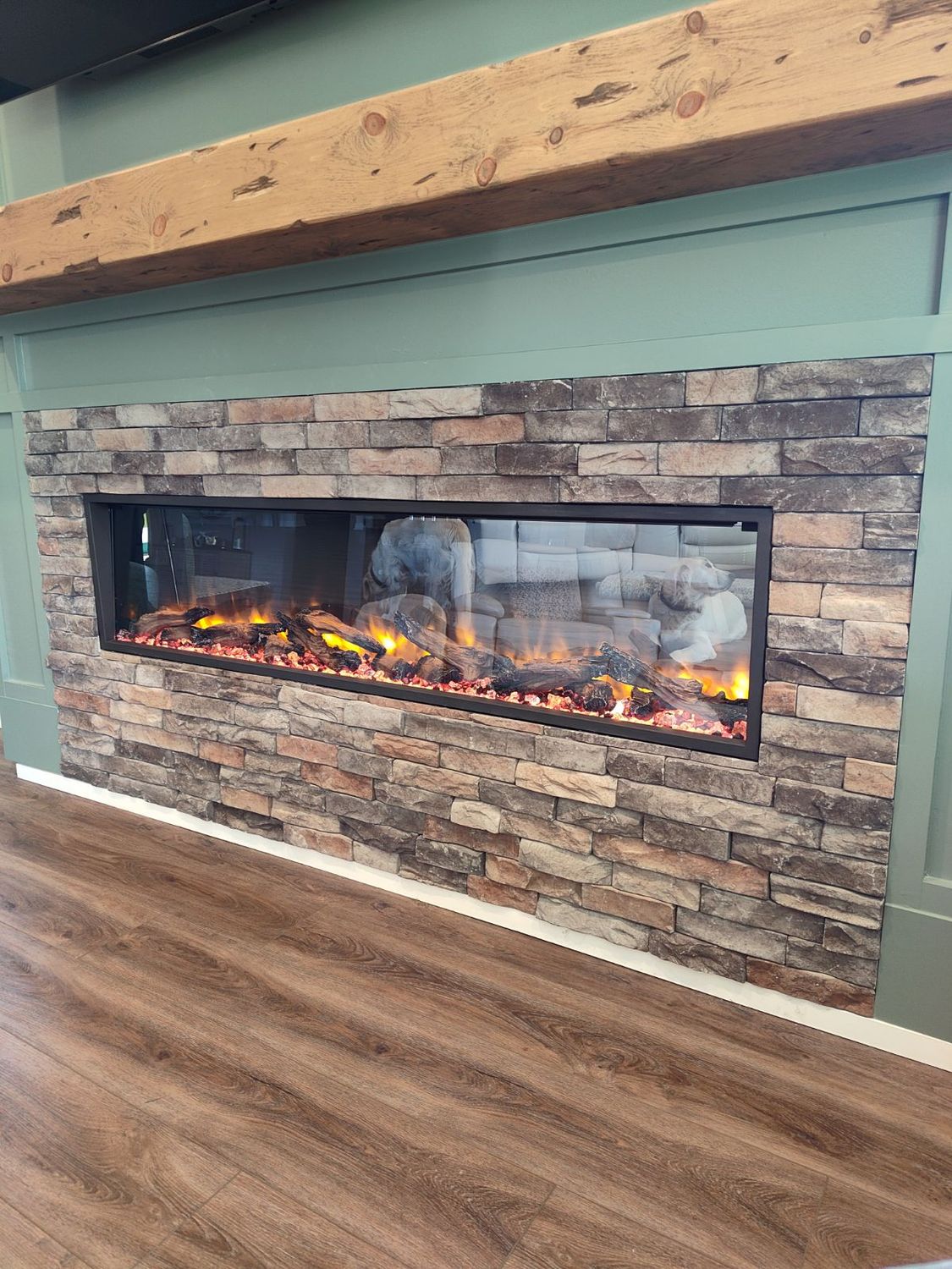 Stacked stone fireplace feature wall by Stephen Wade Gibson Flooring, Central Florida