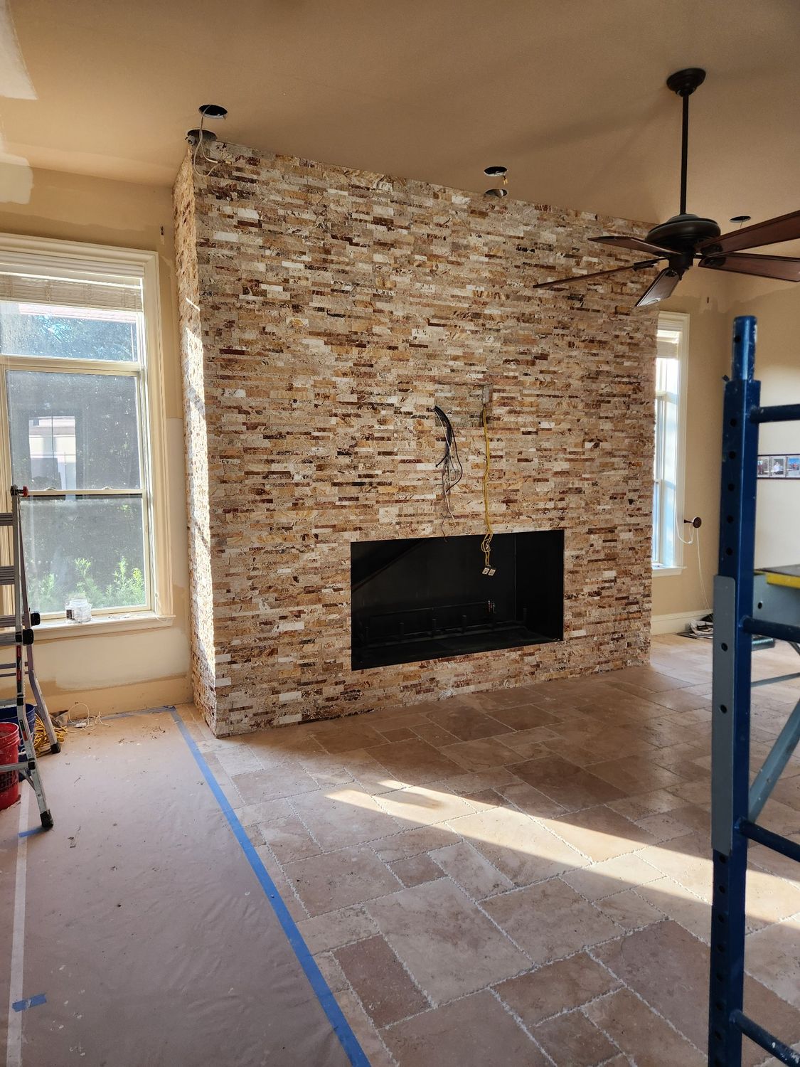 Stone fireplace great room by Stephen Wade Gibson Flooring, Central Florida