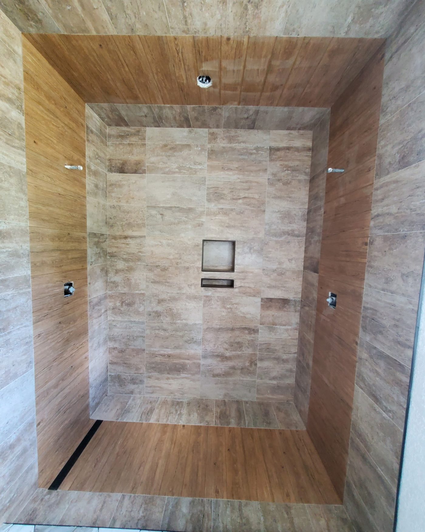 Wood-look tile shower walls and ceiling